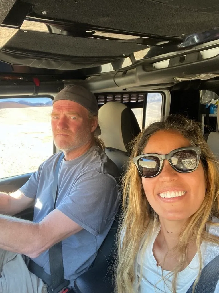 Brett and Karla driving their Jeep Wrangler during an overland journey
