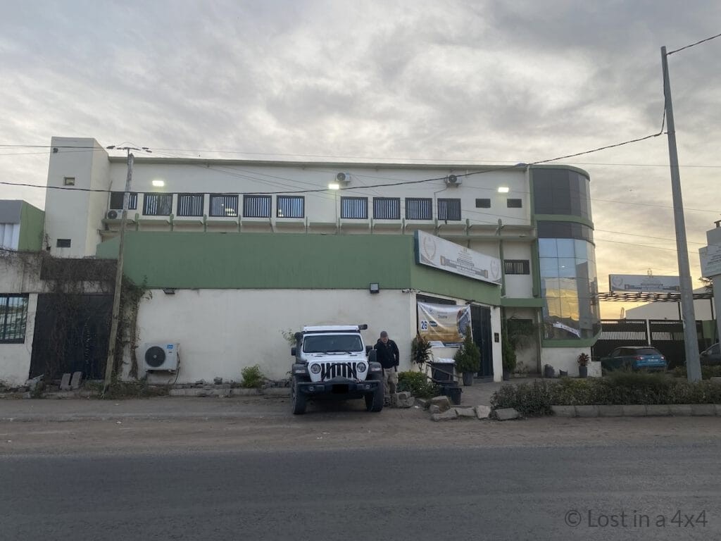 Front entrance of the Bureau Guichet Unique des Véhicules in Dakar, Senegal, where overlanders extend their vehicle passavant