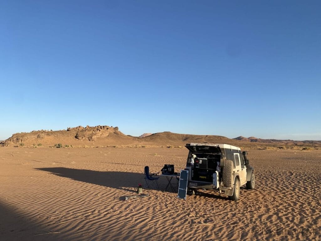 Back view of our Jeep at the wild camp overlooking the Lost City of Bah Haoudou in Morocco