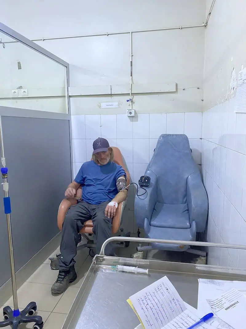 Brett recovering after epinephrine treatment at Hôpital de la Paix in Ziguinchor Senegal.