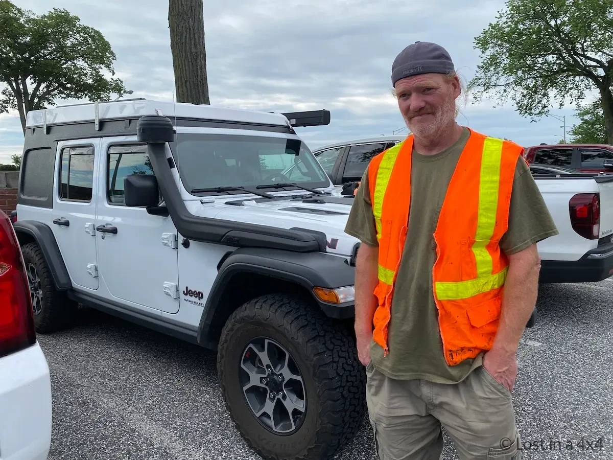 Brett standing in front of Jeep overland rig before driving to port for shipping drop-off in Baltimore USA