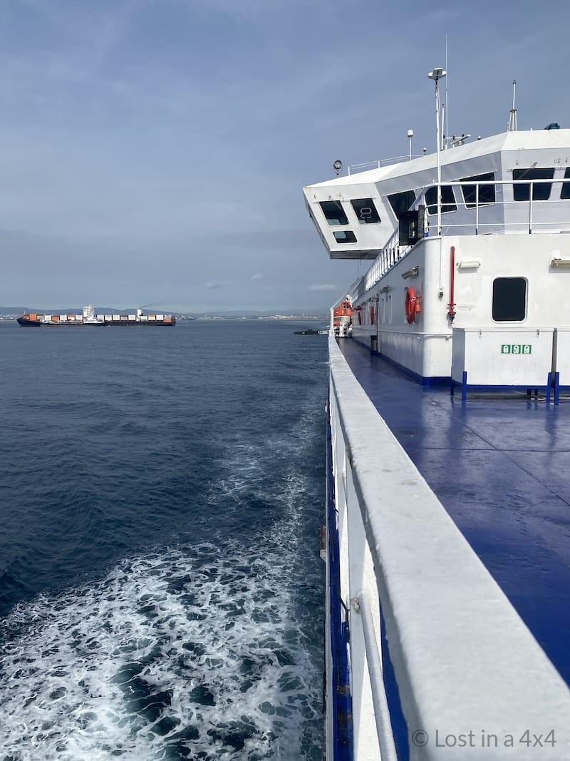 View from the dock showing a ferry and open ocean with another boat en route to Tangier Med, Morocco