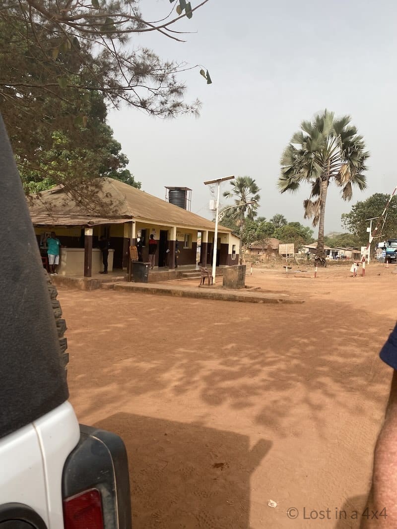 Guinea-Bissau customs office at the Djegue border crossing where Carnet de Passage documents are stamped for vehicle entry