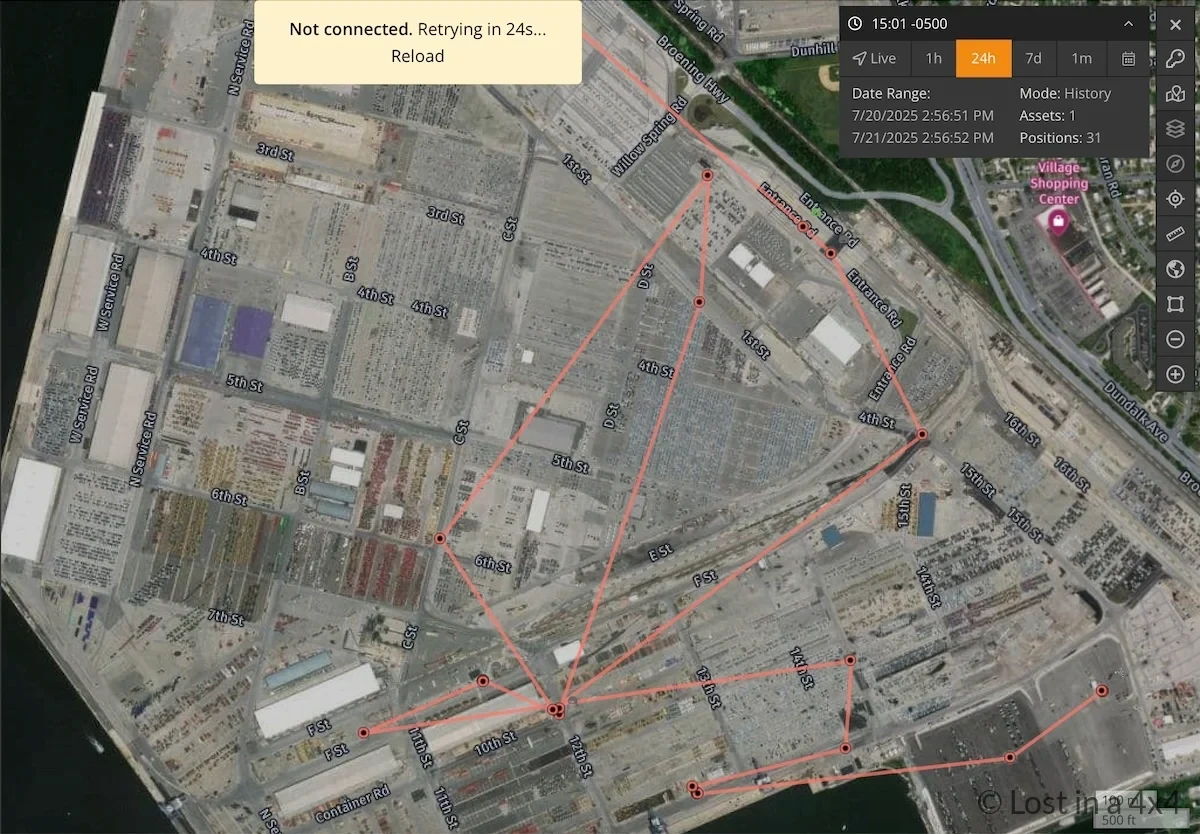 Jeep GPS navigation showing route through Port of Baltimore while following escort during shipping process
