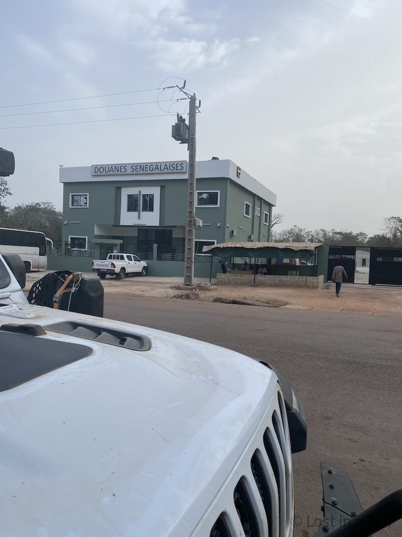 Jeep Wrangler parked outside the Senegalese customs office at the Mpack-Djengue border crossing where Carnet de Passage documents are stamped.