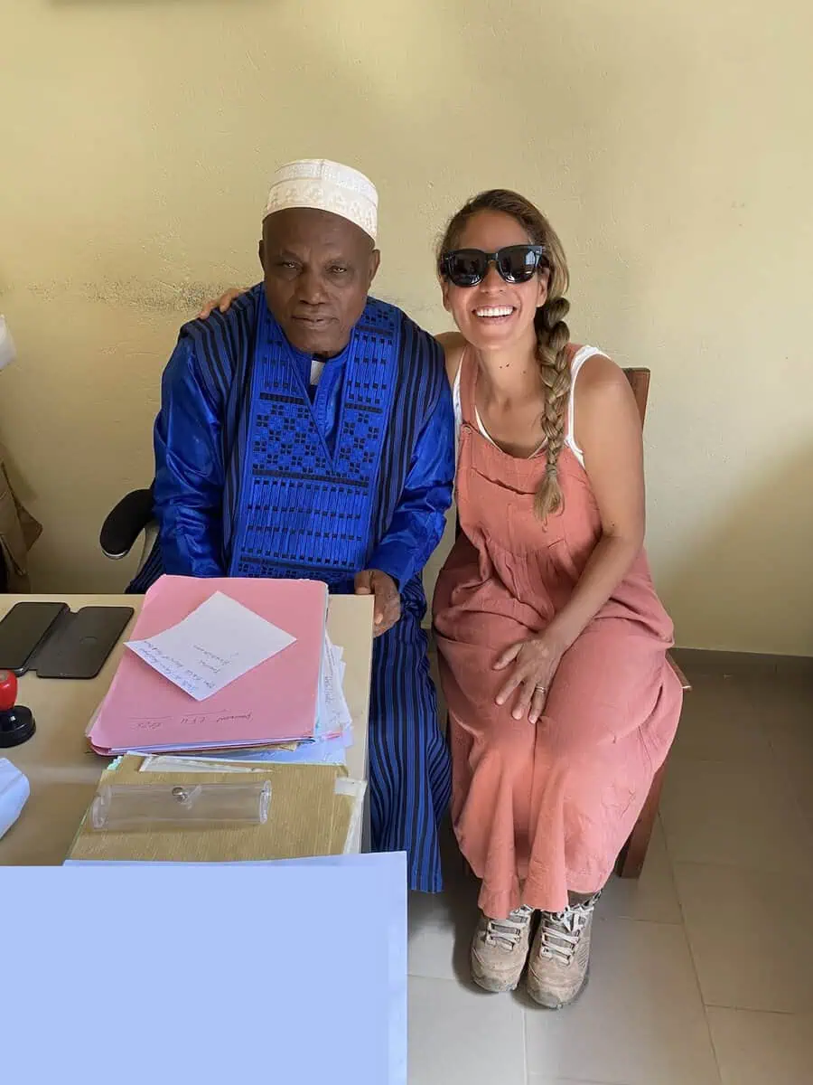 Karla meeting the mayor of Browal Tappe Prefecture in Guinea before visiting Kambadaga Waterfall