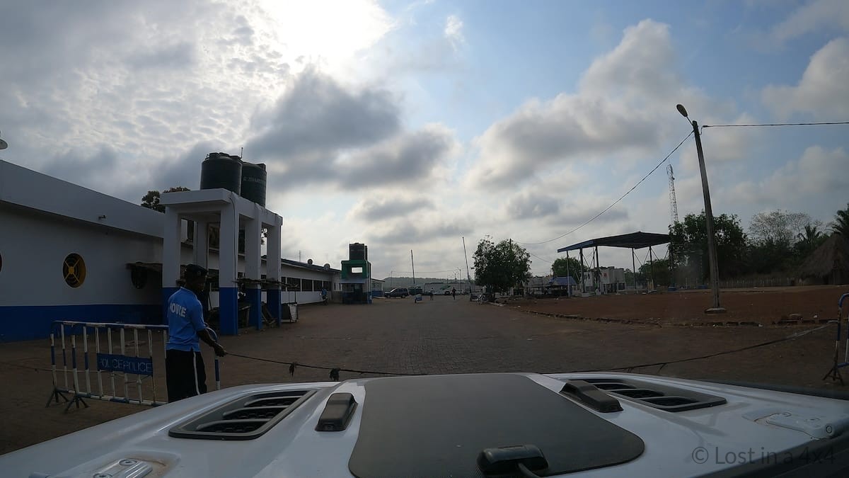 Police roadblock before the Sierra Leone border post seen from inside a Jeep Wrangler Rubicon during a West Africa overland journey