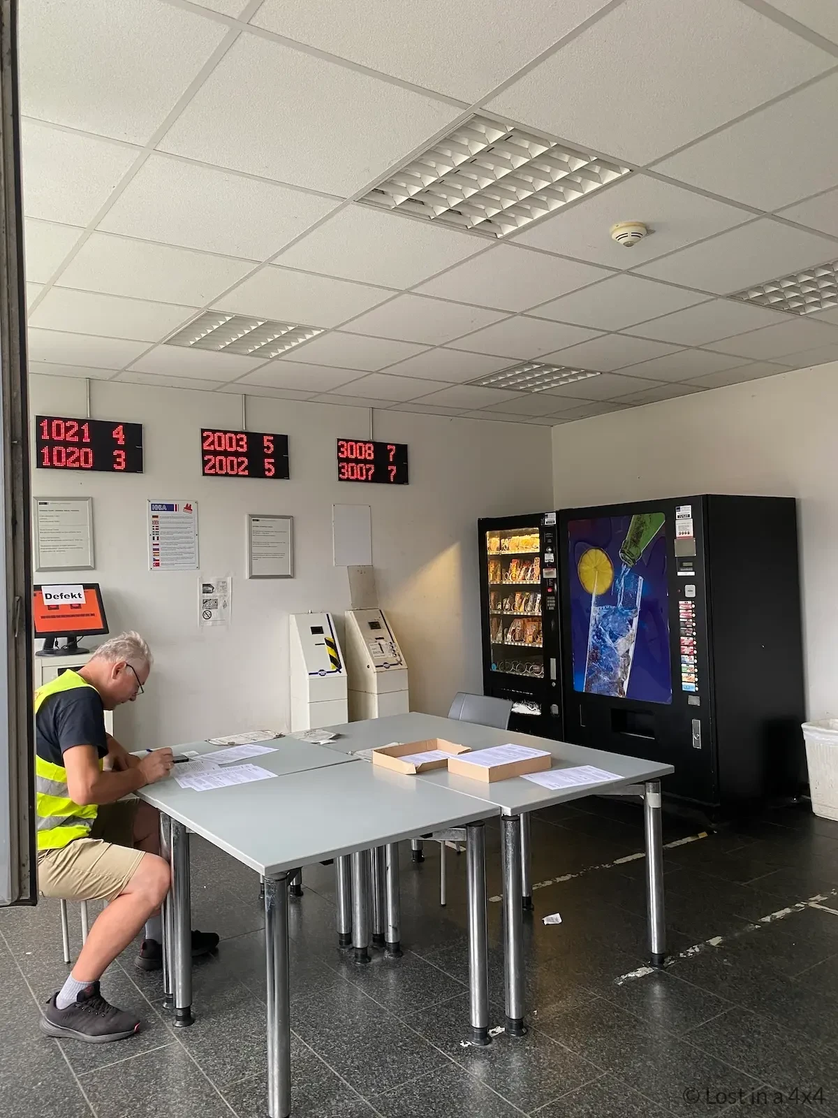 Waiting room inside Unikai port office in Hamburg during vehicle pick-up process