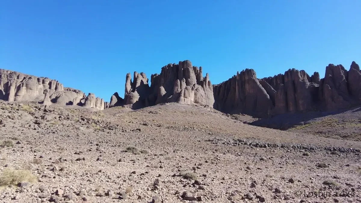 Giant finger-like rock formations dominating the landscape near Pâte de l'Éléphant in Morocco.