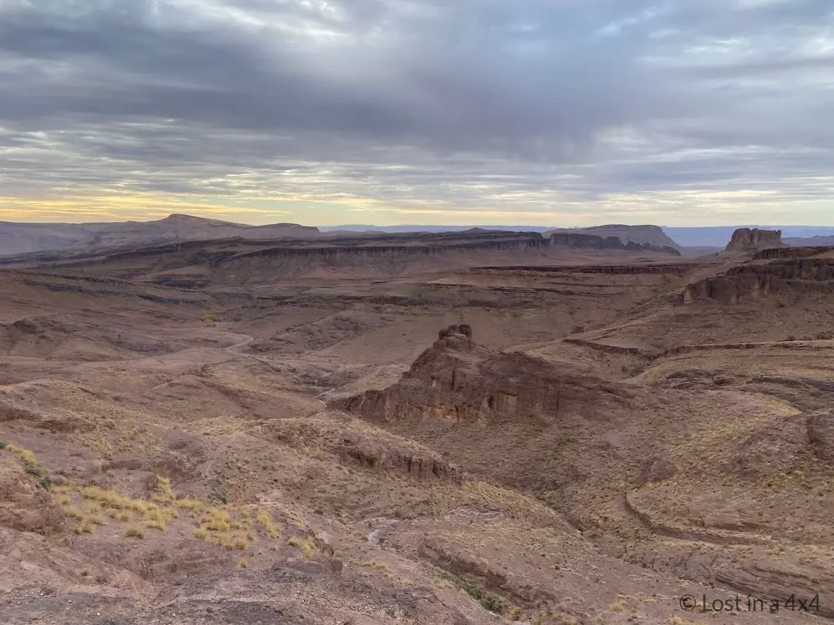 View from our wild camping spot near Pâte de l'Éléphant showing the mountain landscape and 4x4 route we drove in Morocco.